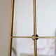 gold arched mirror
